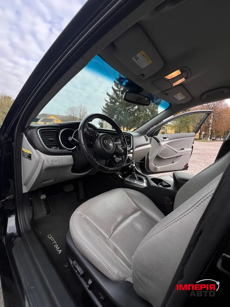 Kia Optima - фото 5