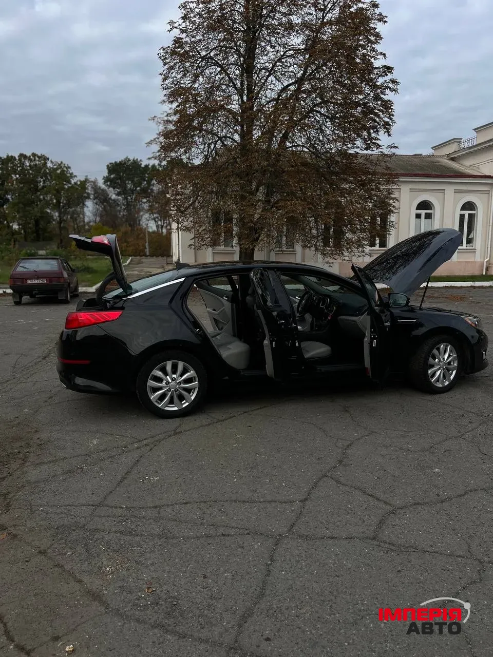 Kia Optima - фото 14