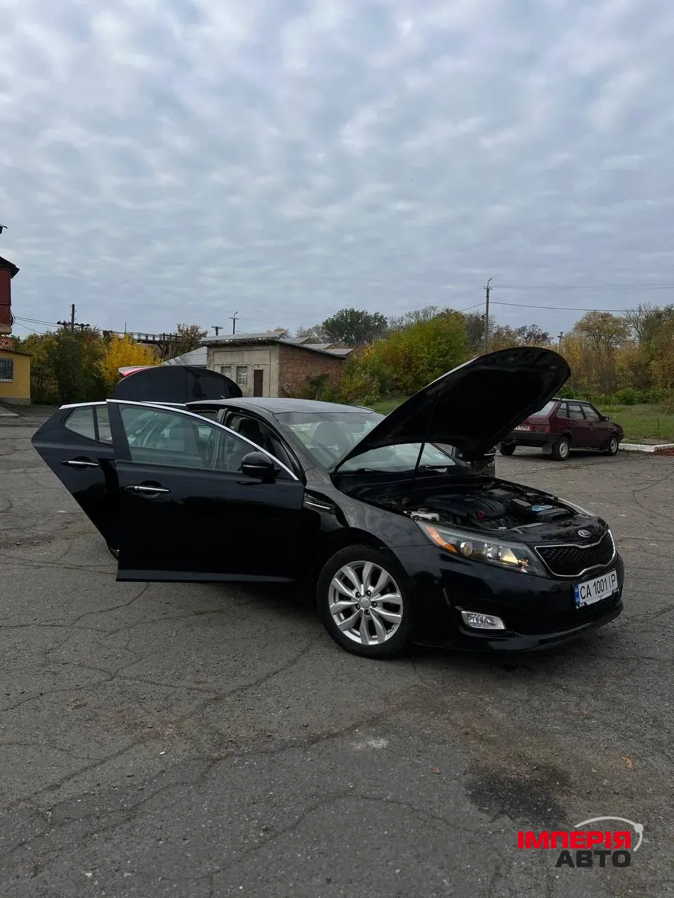 Kia Optima - фото 17