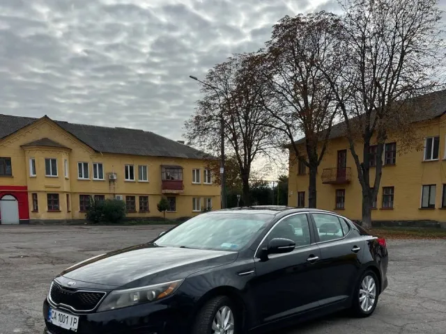 Kia Optima - фото 1