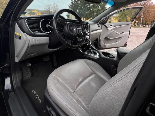 Kia Optima - фото 5