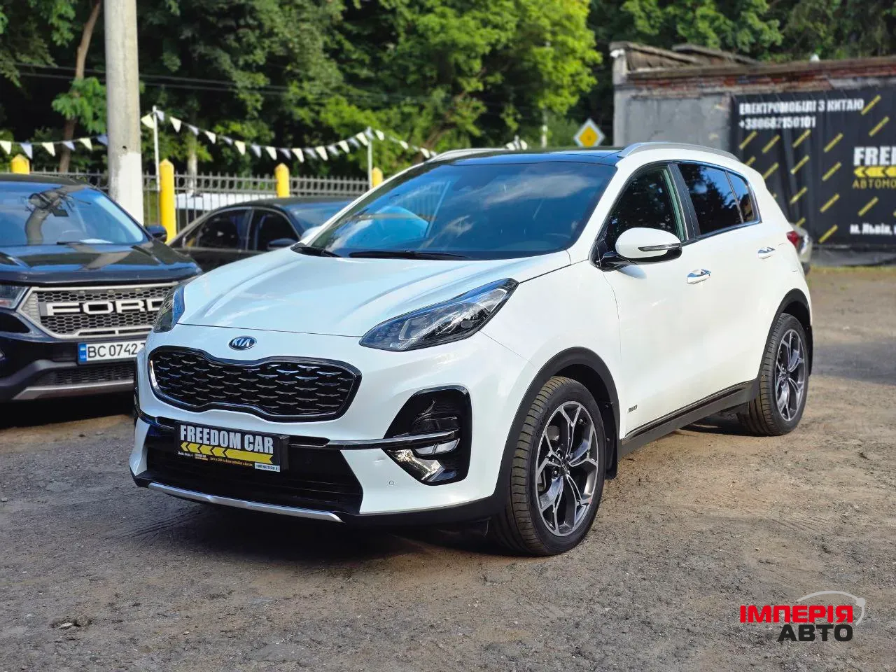 Kia Sportage - фото 1