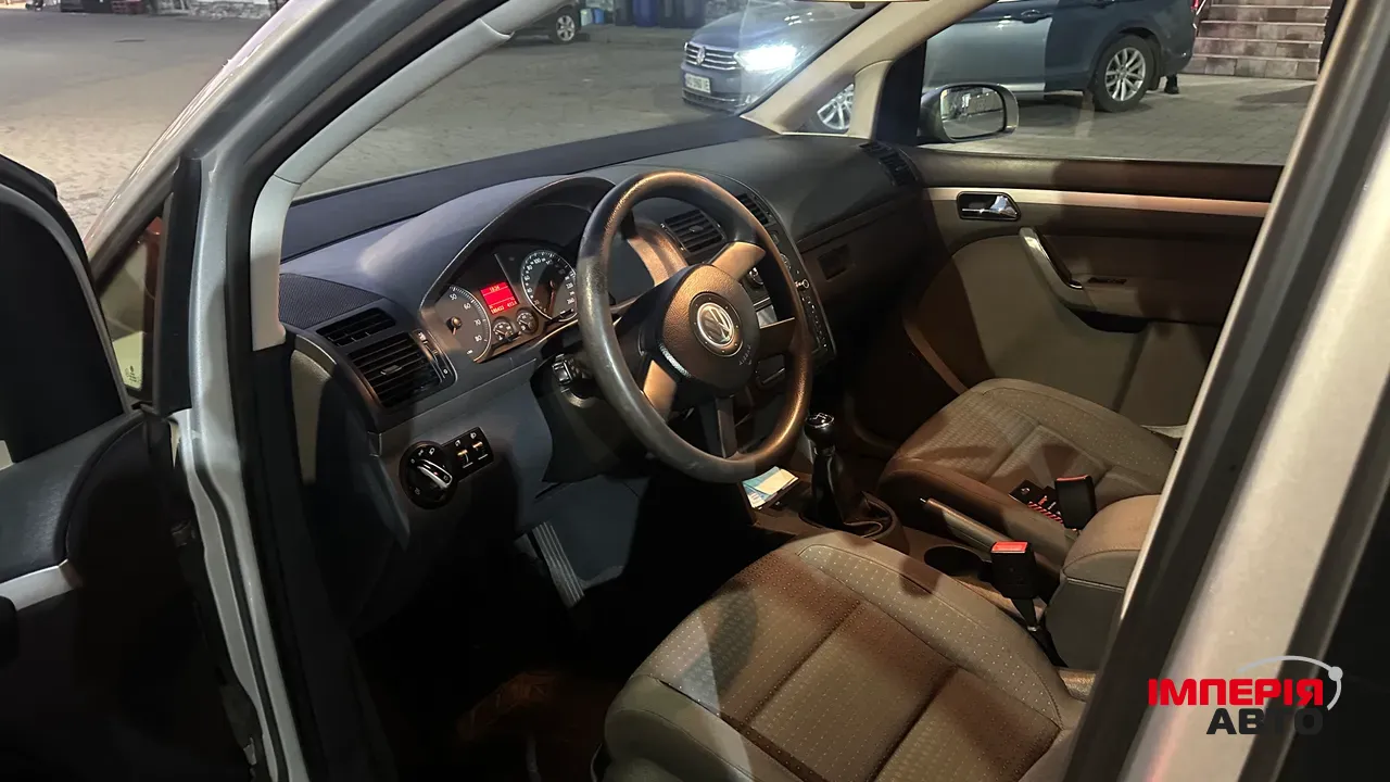 Volkswagen Touran - фото 11