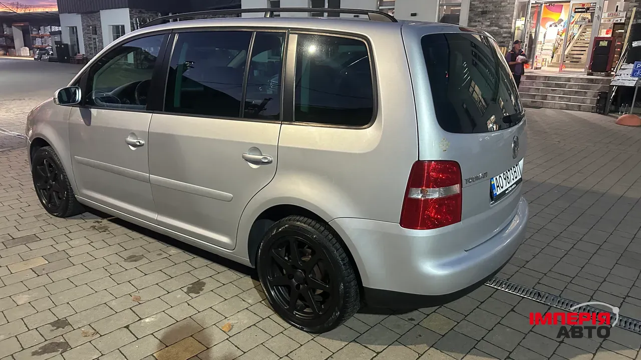 Volkswagen Touran - фото 7