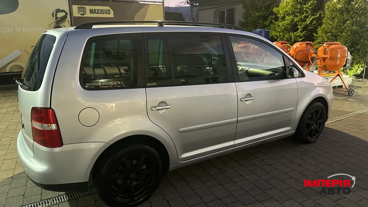 Volkswagen Touran - фото 10