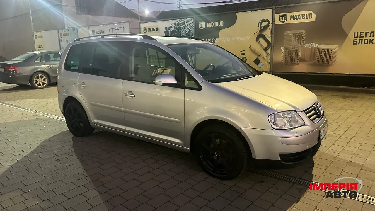 Volkswagen Touran - фото 4