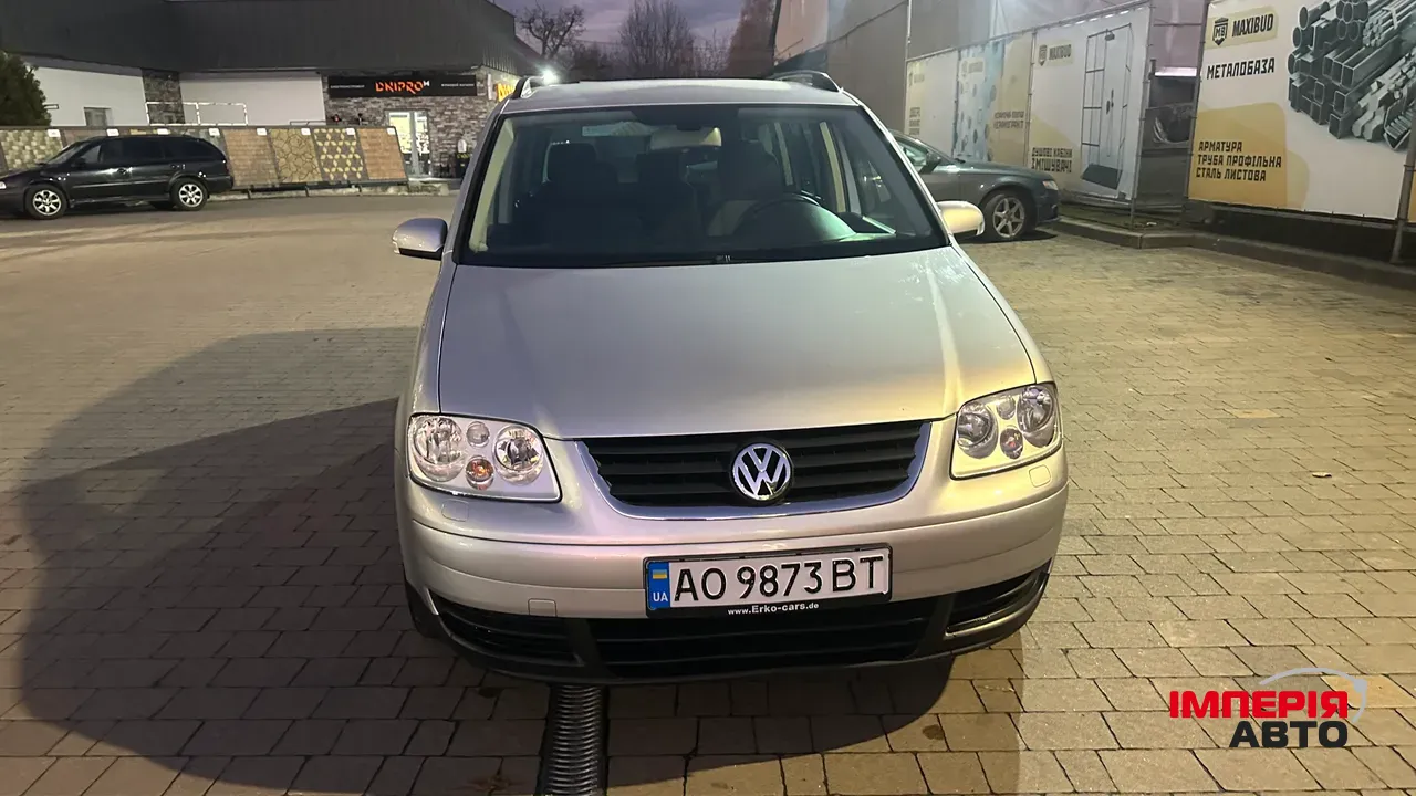 Volkswagen Touran - фото 2