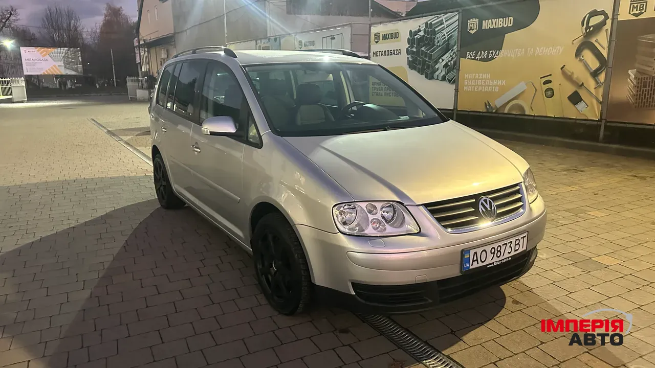 Volkswagen Touran - фото 3