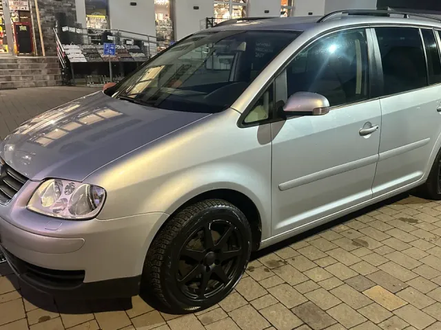 Volkswagen Touran - фото 5