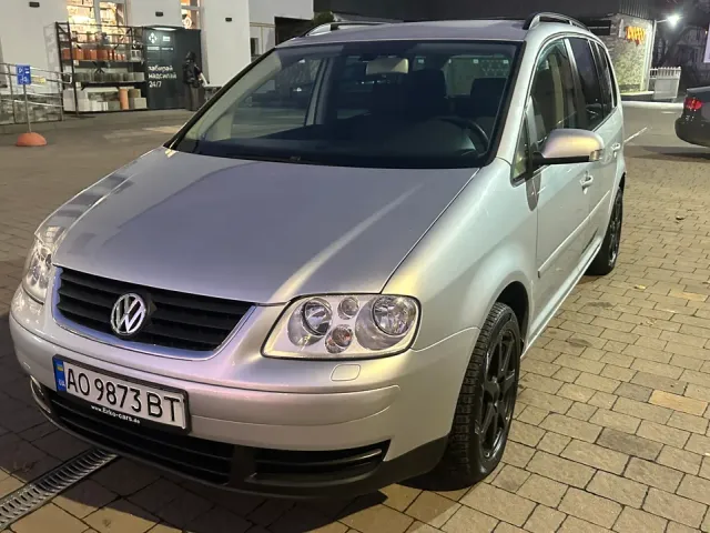 Volkswagen Touran - фото 1