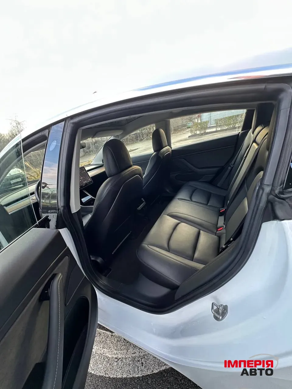 Tesla Model 3 - фото 10