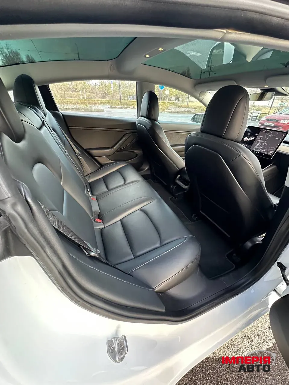Tesla Model 3 - фото 8