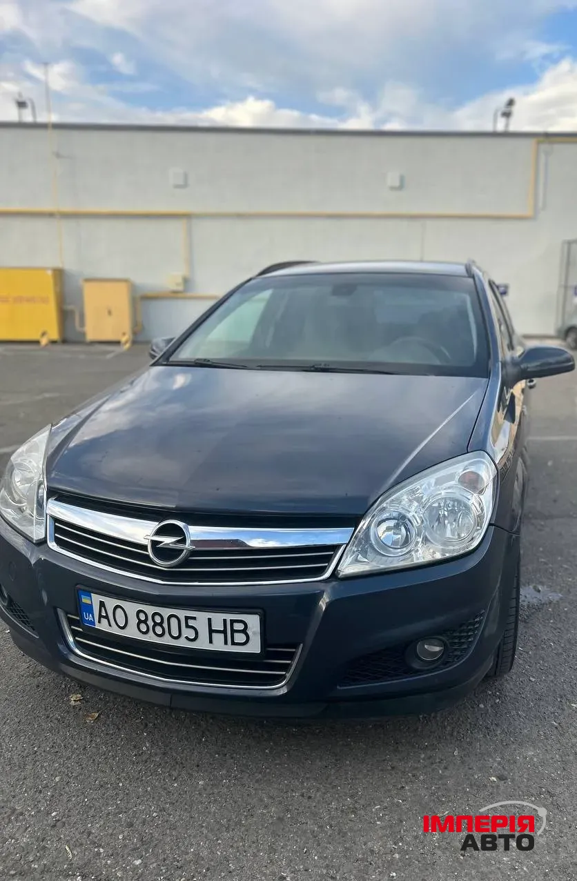 Opel Astra - фото 2