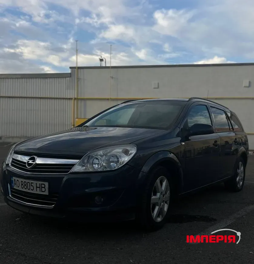Opel Astra - фото 1