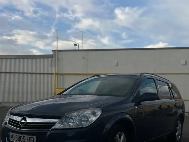 Opel Astra - фото 1