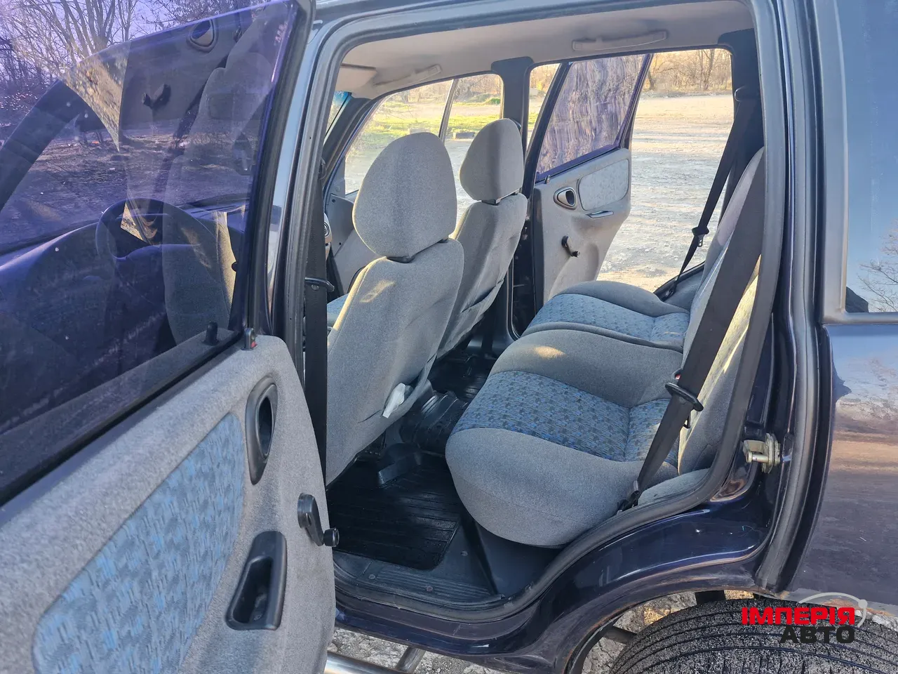 Chevrolet Niva - фото 12