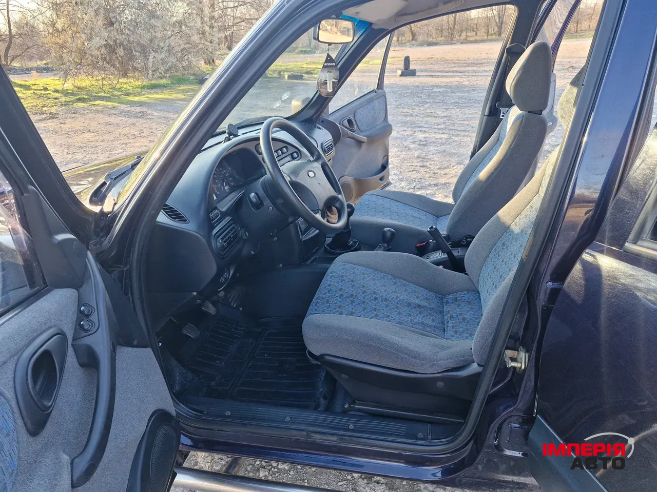 Chevrolet Niva - фото 13