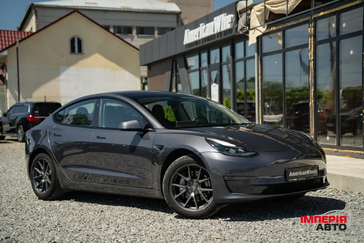 Tesla Model 3 - фото 11
