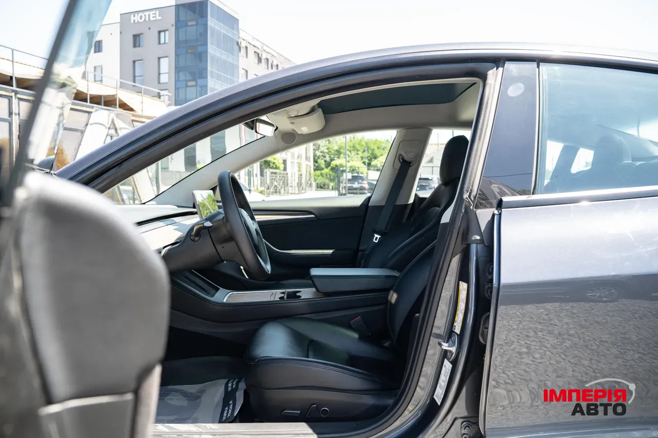Tesla Model 3 - фото 16