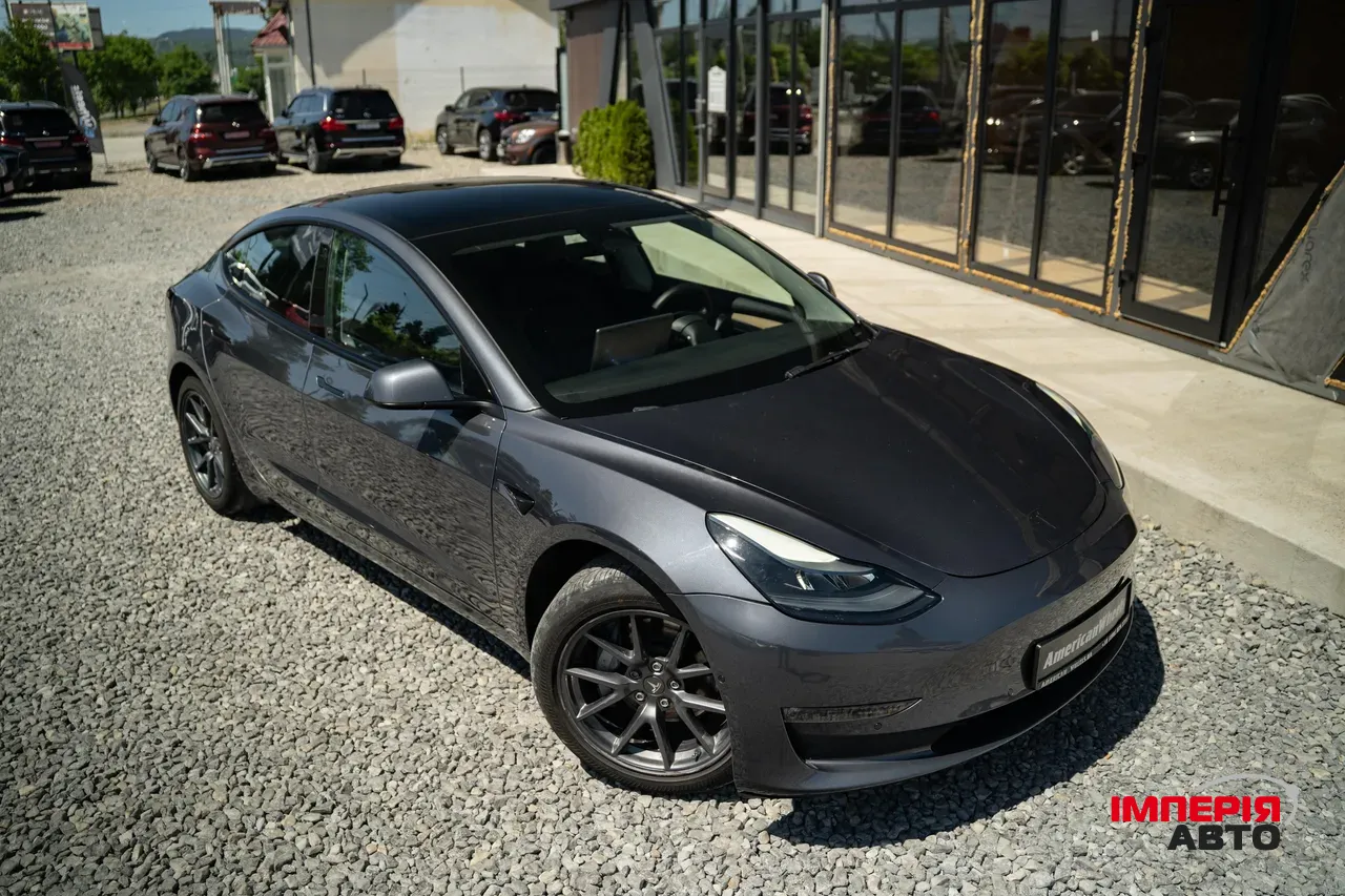 Tesla Model 3 - фото 10