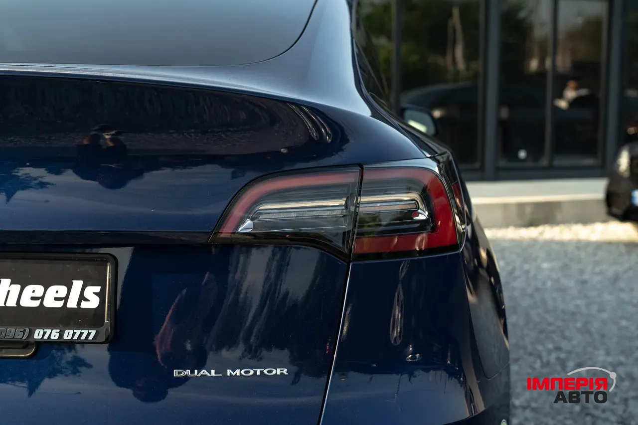 Tesla Model Y - фото 7