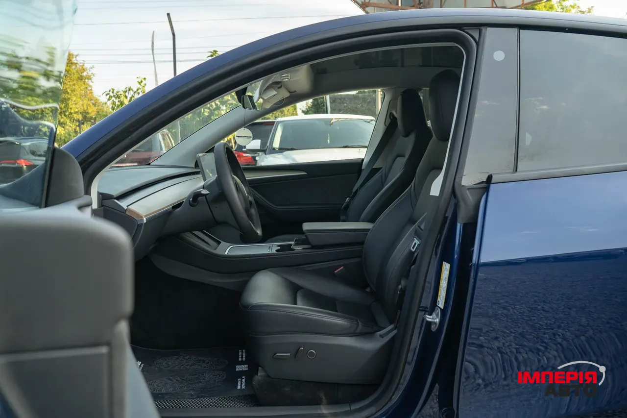 Tesla Model Y - фото 11