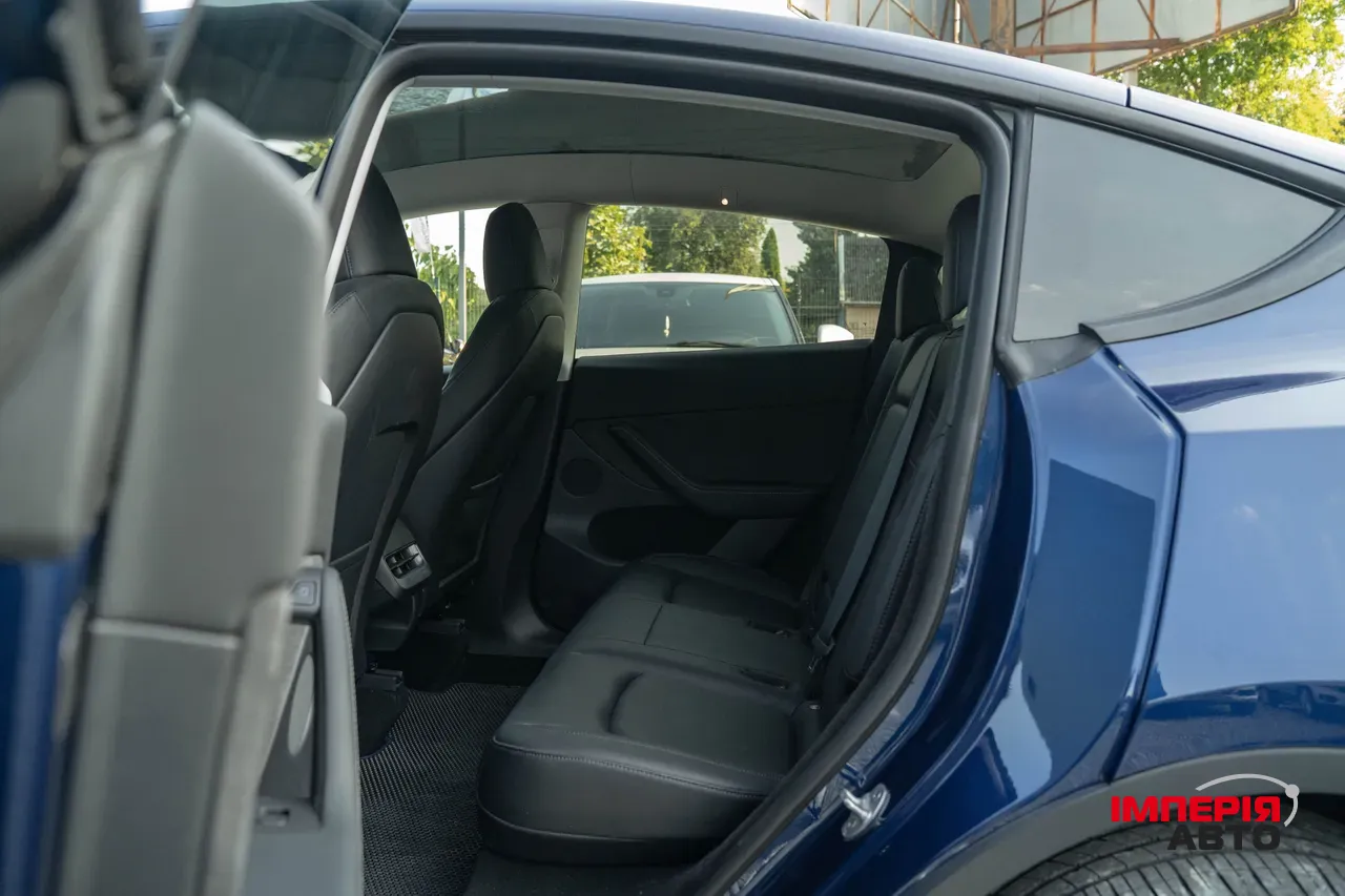 Tesla Model Y - фото 24