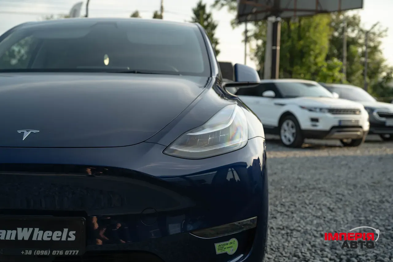 Tesla Model Y - фото 8