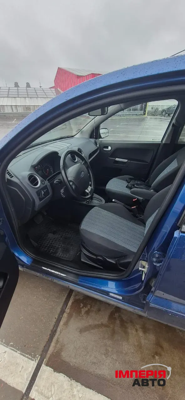 Ford Fusion - фото 9