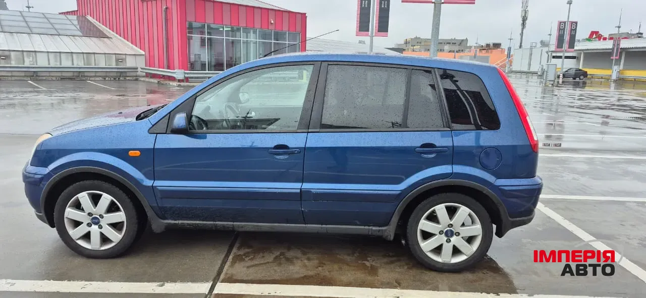 Ford Fusion - фото 7