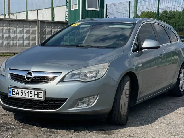 Opel Astra - фото 1