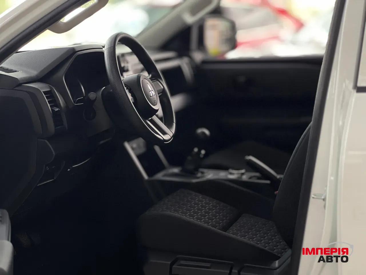 Mitsubishi L200 - фото 10