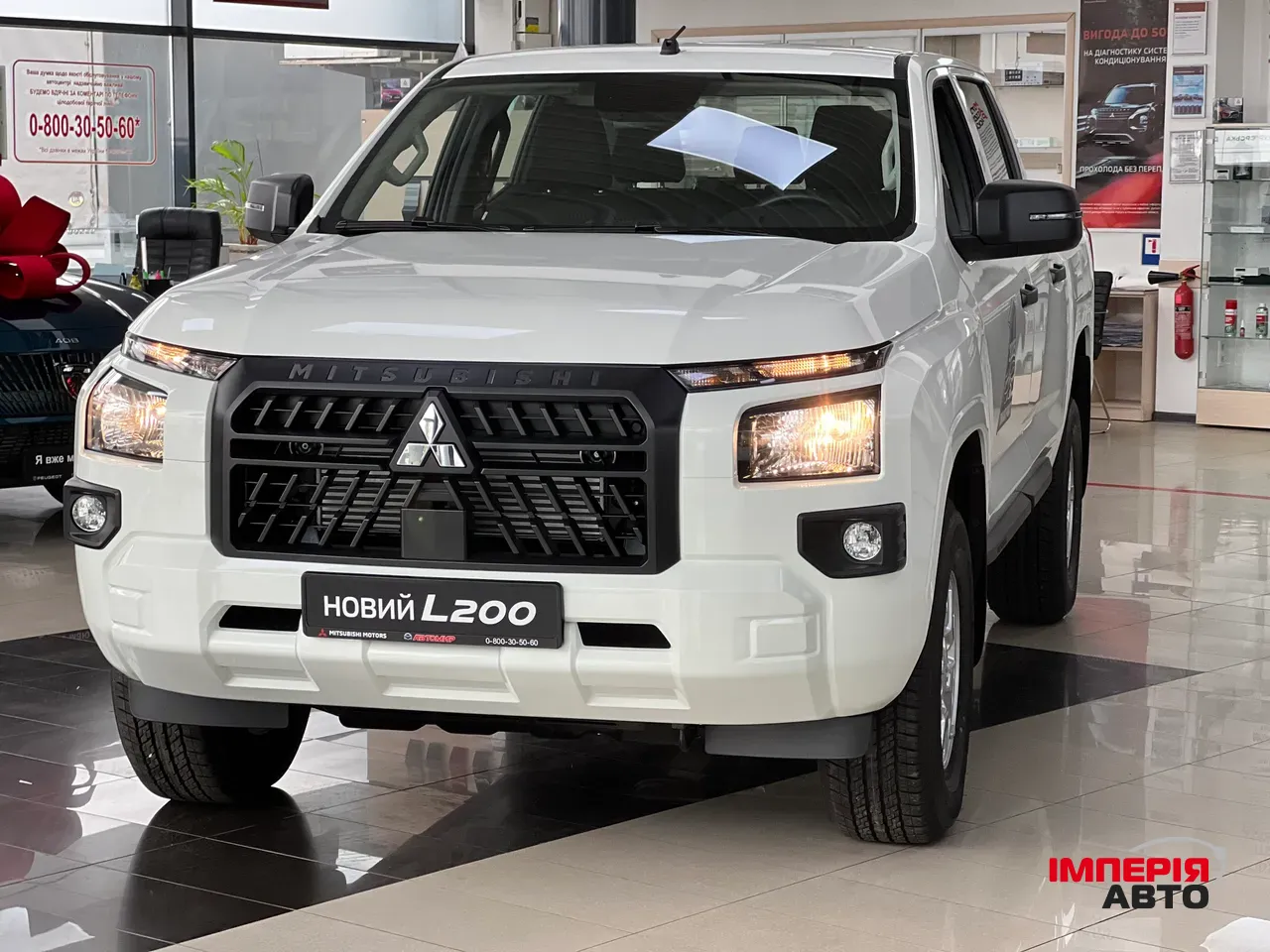 Mitsubishi L200 - фото 1