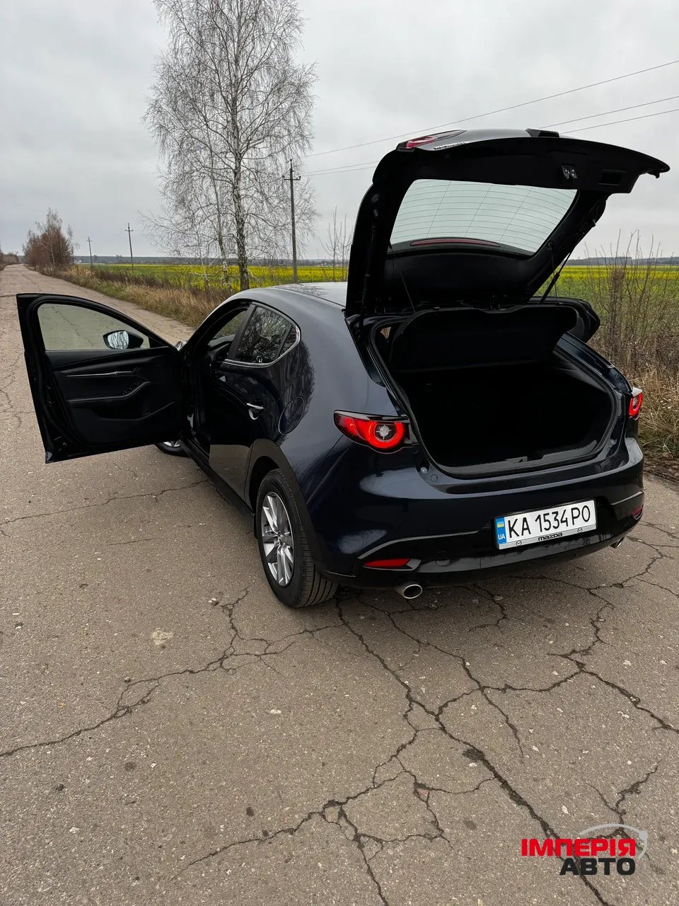 Mazda 3 - фото 11