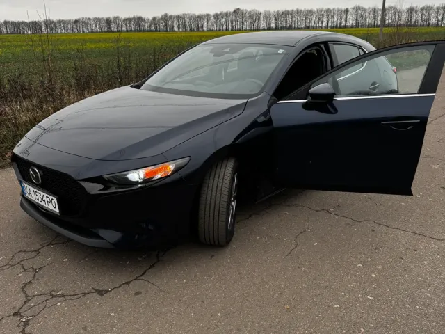 Mazda 3 - фото 1
