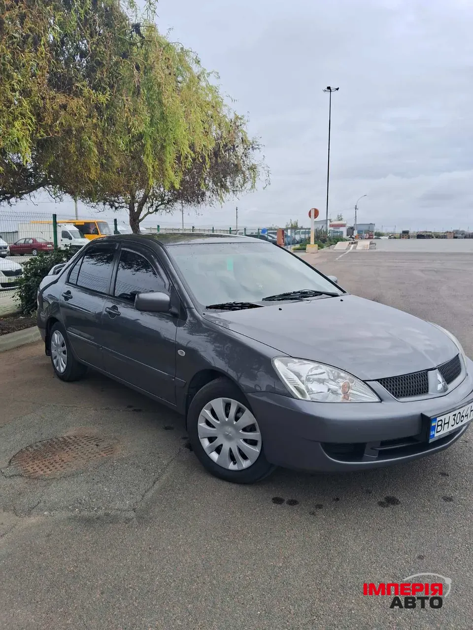 Mitsubishi Lancer - фото 1