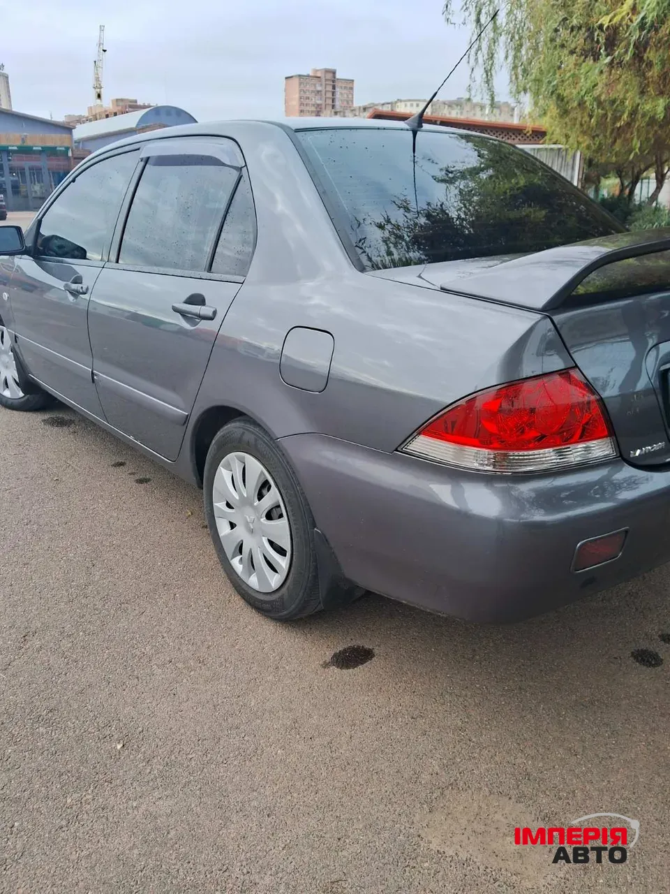 Mitsubishi Lancer - фото 3