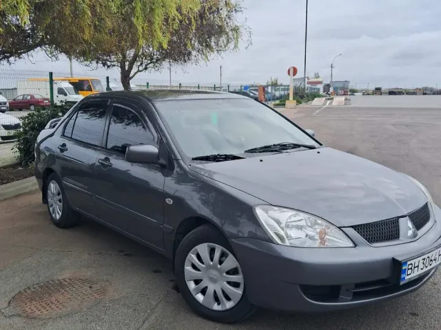 Mitsubishi Lancer - фото 1