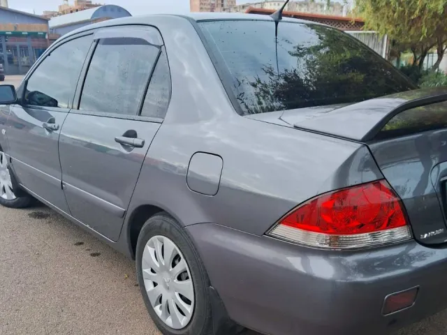 Mitsubishi Lancer - фото 3