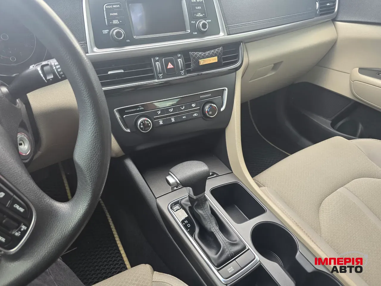 Kia Optima - фото 4