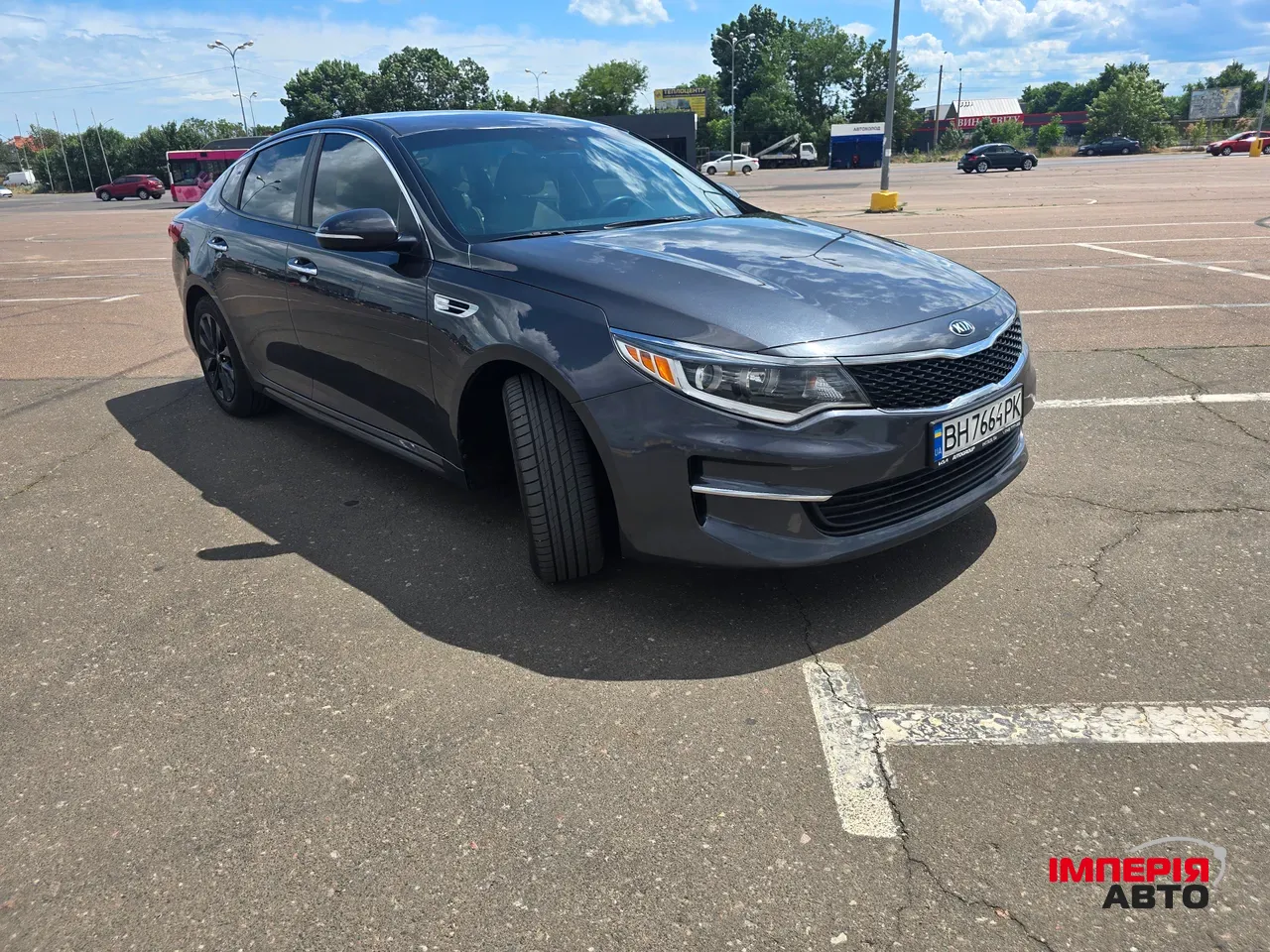 Kia Optima - фото 10
