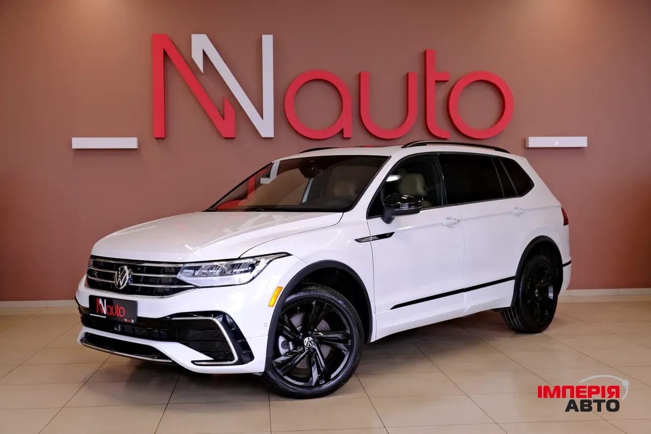 Volkswagen Tiguan - фото 1