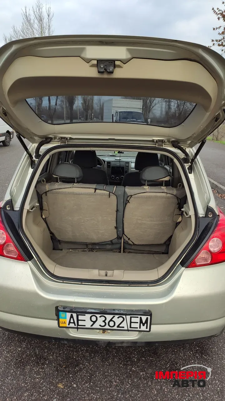 Nissan Tiida - фото 13