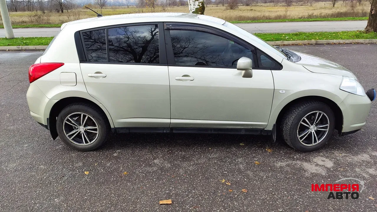 Nissan Tiida - фото 8