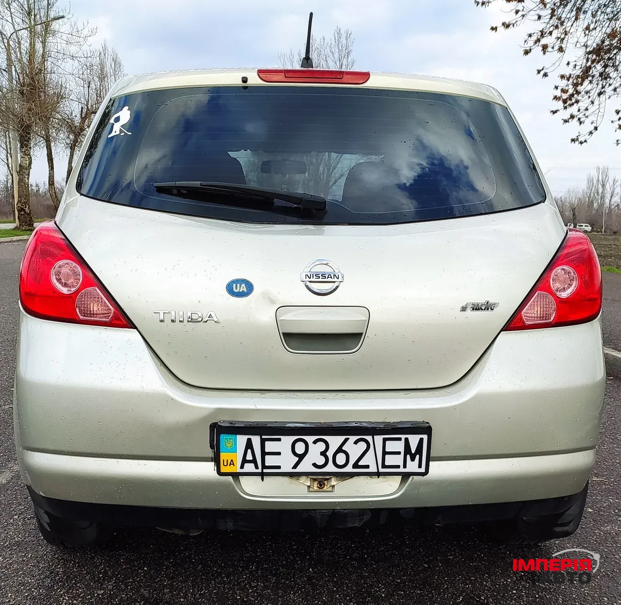 Nissan Tiida - фото 3