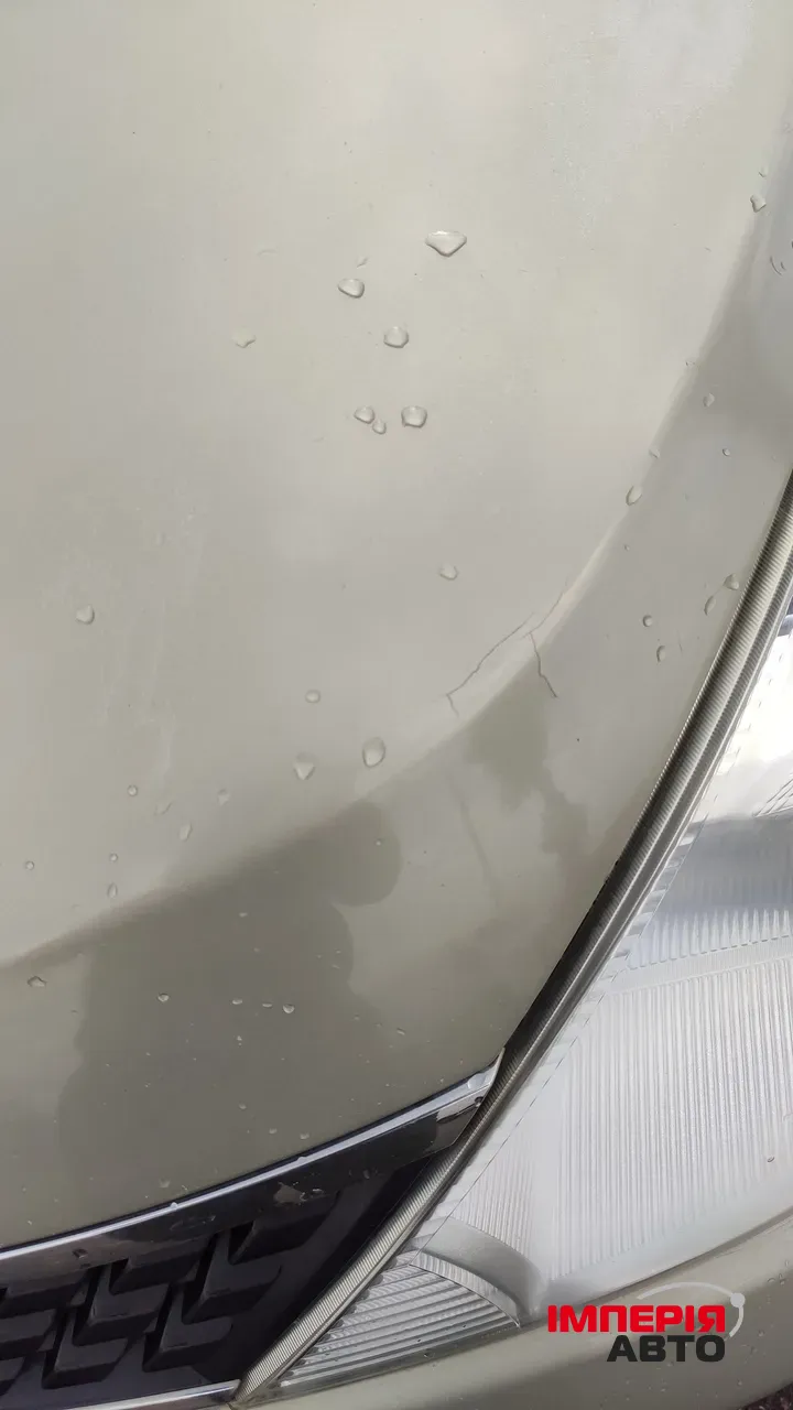 Nissan Tiida - фото 16