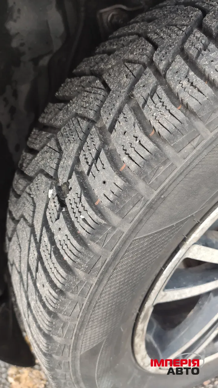 Nissan Tiida - фото 17