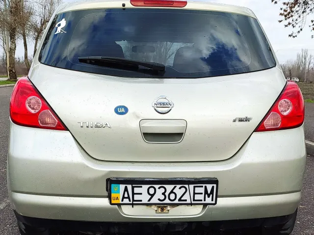 Nissan Tiida - фото 3