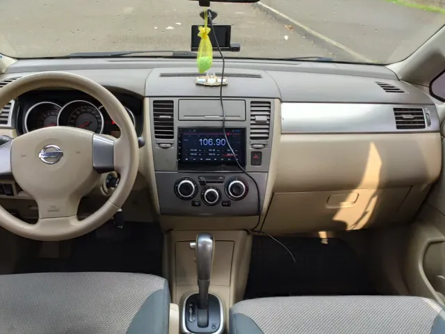 Nissan Tiida - фото 5