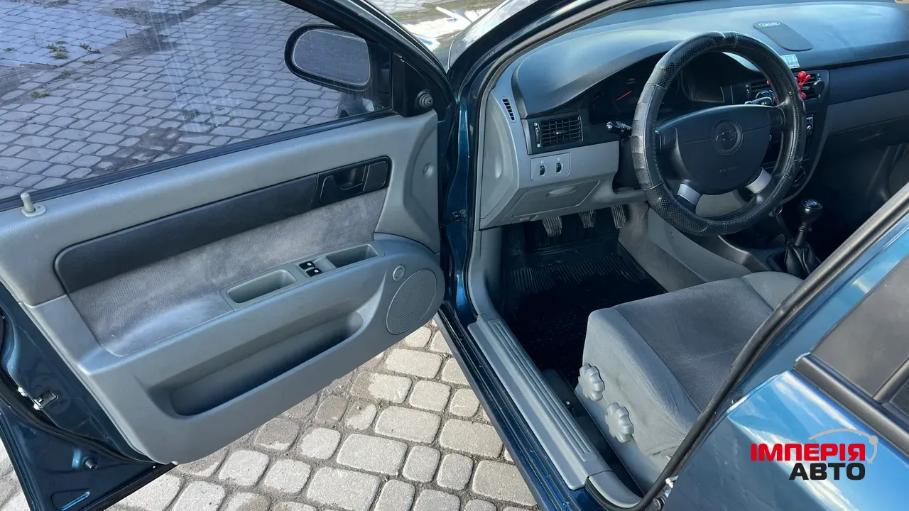 Chevrolet Lacetti - фото 12